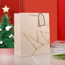 Хартиена торбичка за подарък Raya Toys Marble Gold M, 32 см.